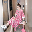 Striped maternity dress in red and white, showcasing a loose fit and casual style for summer wear.