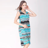 Round neck cotton nursing dress in turquoise with tribal patterns, perfect for summer maternity wear.