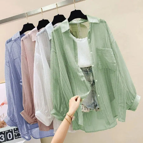 SunVeil™ lightweight sheer chiffon cardigan in various colors displayed on hangers.