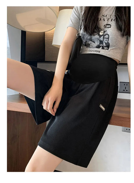 Plus size wide leg maternity pants, summer capris in black, designed for comfort and style for expectant mothers.