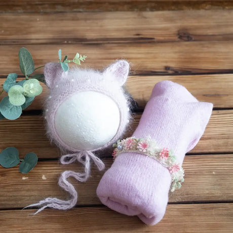 Newborn stretch knit mohair hat and wrap set in soft pink, perfect for unisex baby photo shoots.