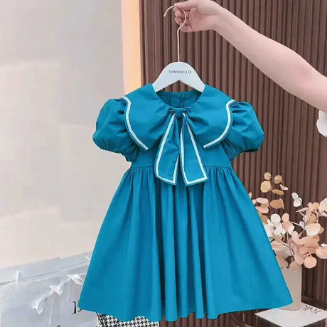 Cute blue summer dress for baby girls with puff sleeves and Peter Pan collar, perfect for ages 4-6Y.