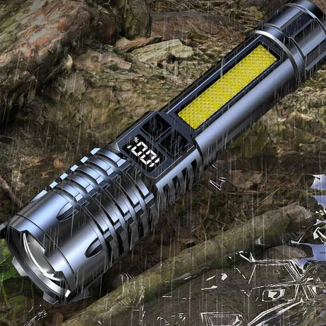 Heinast high power rechargeable LED flashlight on wet ground, showcasing its durability and adjustable beam features.