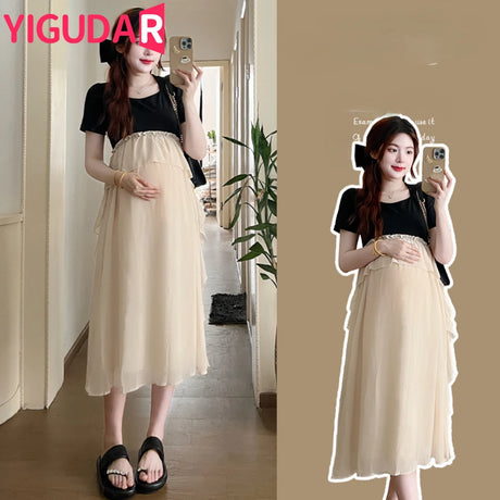 Short sleeve maternity dress in beige and black for summer casual style, designed for comfort and elegance during pregnancy.