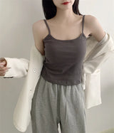 CottoForm™ padded cotton camisole in grey, featuring a slim fit and summer sleeveless design, worn with gray pants.