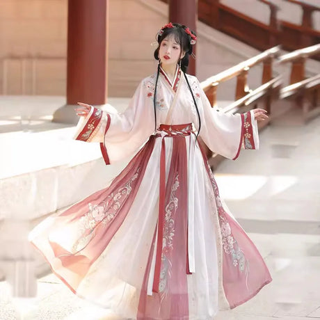 Elegant Hanfu traditional dress for women, featuring floral embroidery and flowing sleeves, perfect for parties.