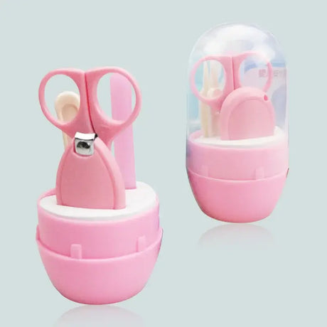 Newborn baby nail scissor set, safe cartoon design in pink, perfect for trimming tiny nails of infants and toddlers.