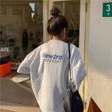 Oversized Harajuku streetwear tee in grey, featuring 'Newtro' text on the back, perfect for casual junior fashion.
