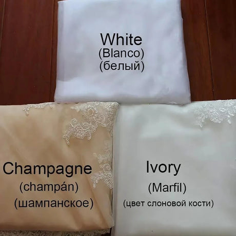 Different satin fabric colors for wedding dresses: White, Champagne, and Ivory swatches with labels.