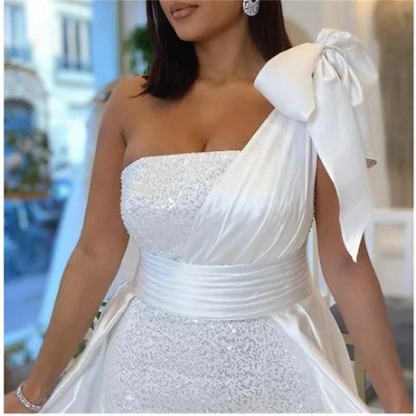 Elegant Mermaid One Shoulder Wedding Dress with Sequins and Ribbon Detail, Chapel Train Style for Brides 2025.
