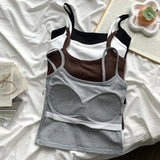 CottoForm™ Padded Cotton Camisoles in grey, black, white, and brown laid on a soft fabric background.