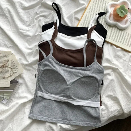 CottoForm™ Padded Cotton Camisoles in grey, black, white, and brown laid on a soft fabric background.