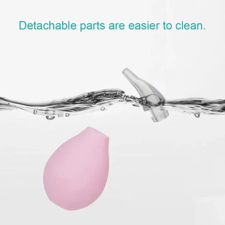 Detachable parts of the Kids Nasal Aspirator Waterdrop for easy cleaning, shown in water.