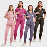 Breathable women's medical scrub sets in pink, lavender, and black, ideal for healthcare and beauty professionals.