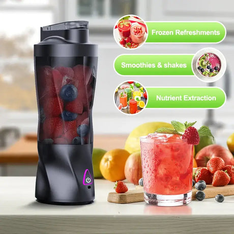 Electric Portable Juicer 700ml by KIRAINAFLY with fruits for smoothies and shakes on a kitchen countertop.