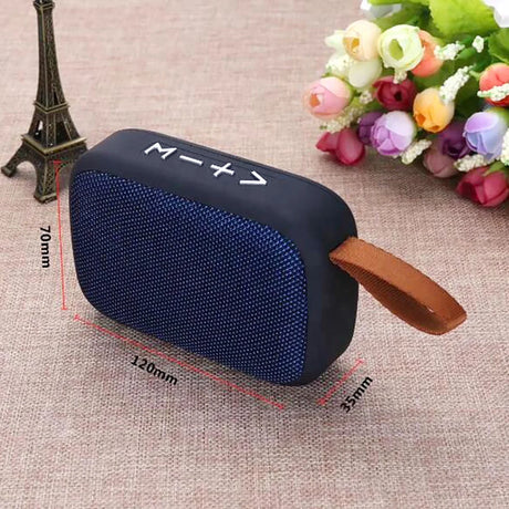 Portable outdoor Bluetooth 5.0 mini speaker with sleek design, suitable for travel and outdoor activities.