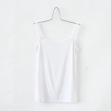 BasicBreeze™ white solid cotton strap camisole hanging on a minimalist hanger.