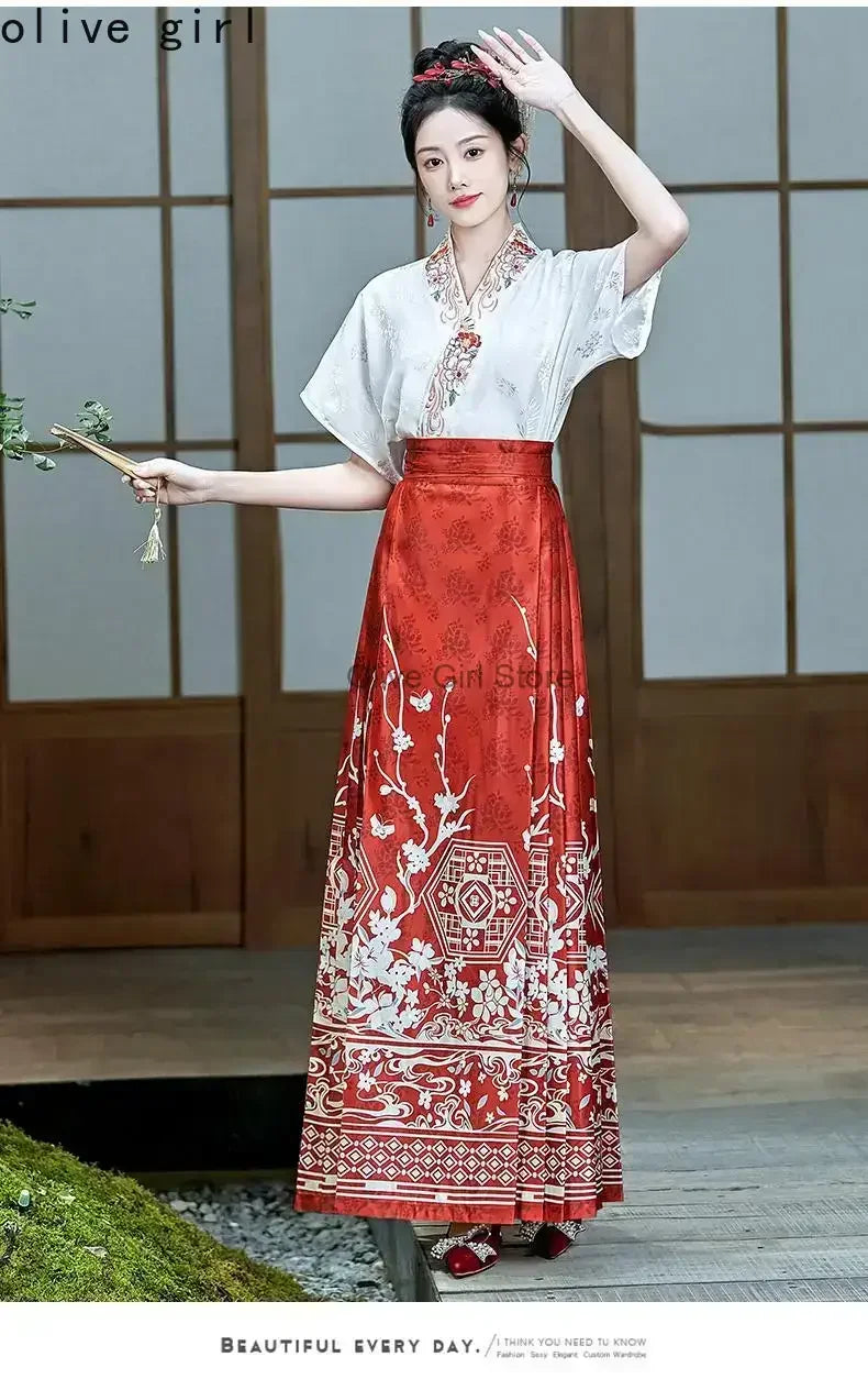 Traditional Hanfu oversized embroidered blouse with red skirt, designed for women by Olive Girl, showcasing intricate patterns.