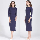 Postpartum nursing maternity dress with 3/4 sleeves, knee-length, in solid navy color, designed for breastfeeding women.
