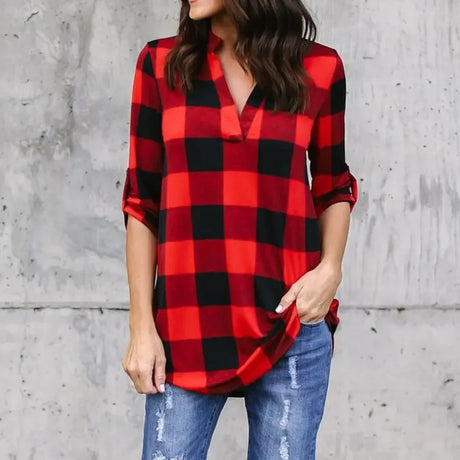 Women wearing a red and black plaid V-neck summer top with rolled sleeves, styled for casual beach outings.