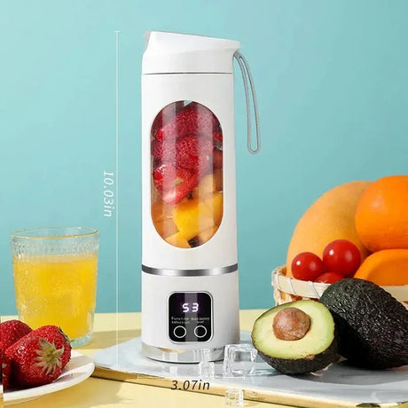 Portable 450ml fruit juicer with mixed fruits, showcasing automatic pulp ejection and user-friendly design.