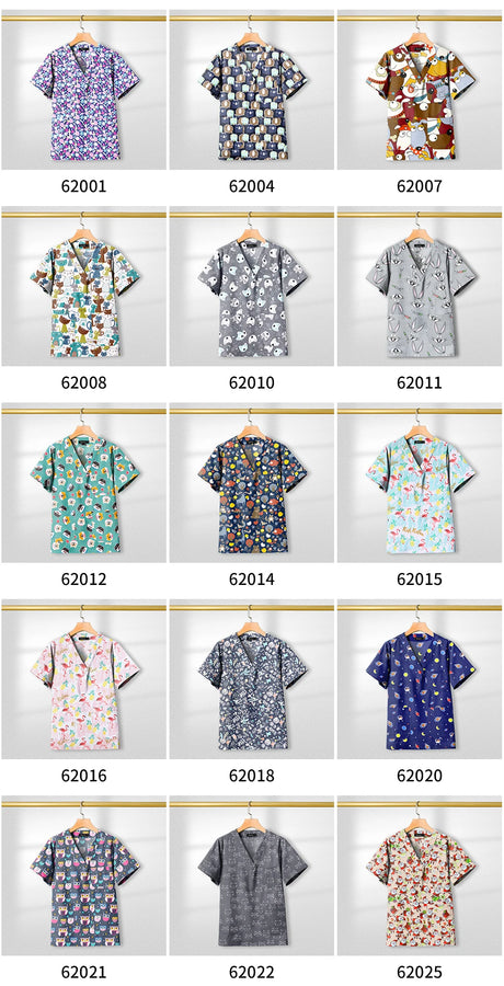 Variety of printed short sleeve nursing scrub tops hanging on display, featuring colorful designs and patterns.
