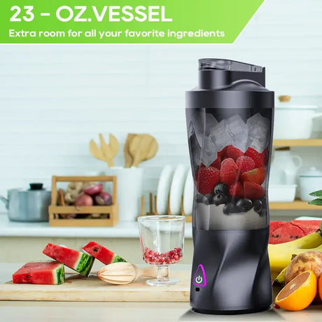 Electric Portable Juicer with 23 oz capacity, filled with fruits and ice, perfect for smoothies and healthy drinks.
