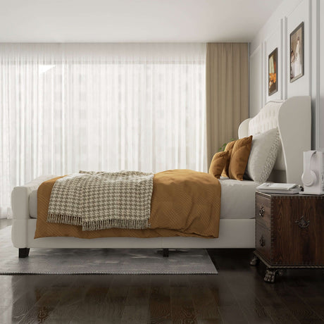 Contemporary 51-inch bed frame with neutral bedding and decorative pillows in a bright, airy bedroom interior.
