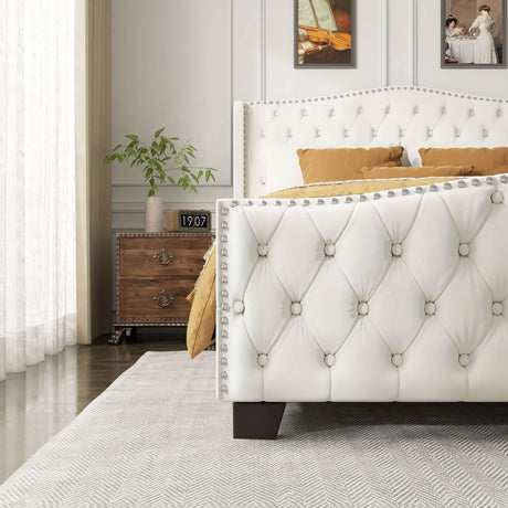 Contemporary bed frame with tufted white upholstery and stylish design, featuring decorative nailhead trim and hardwood base.