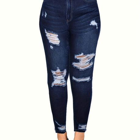 New ripped skinny jeans in dark denim with distressed details, perfect for spring and fall style.